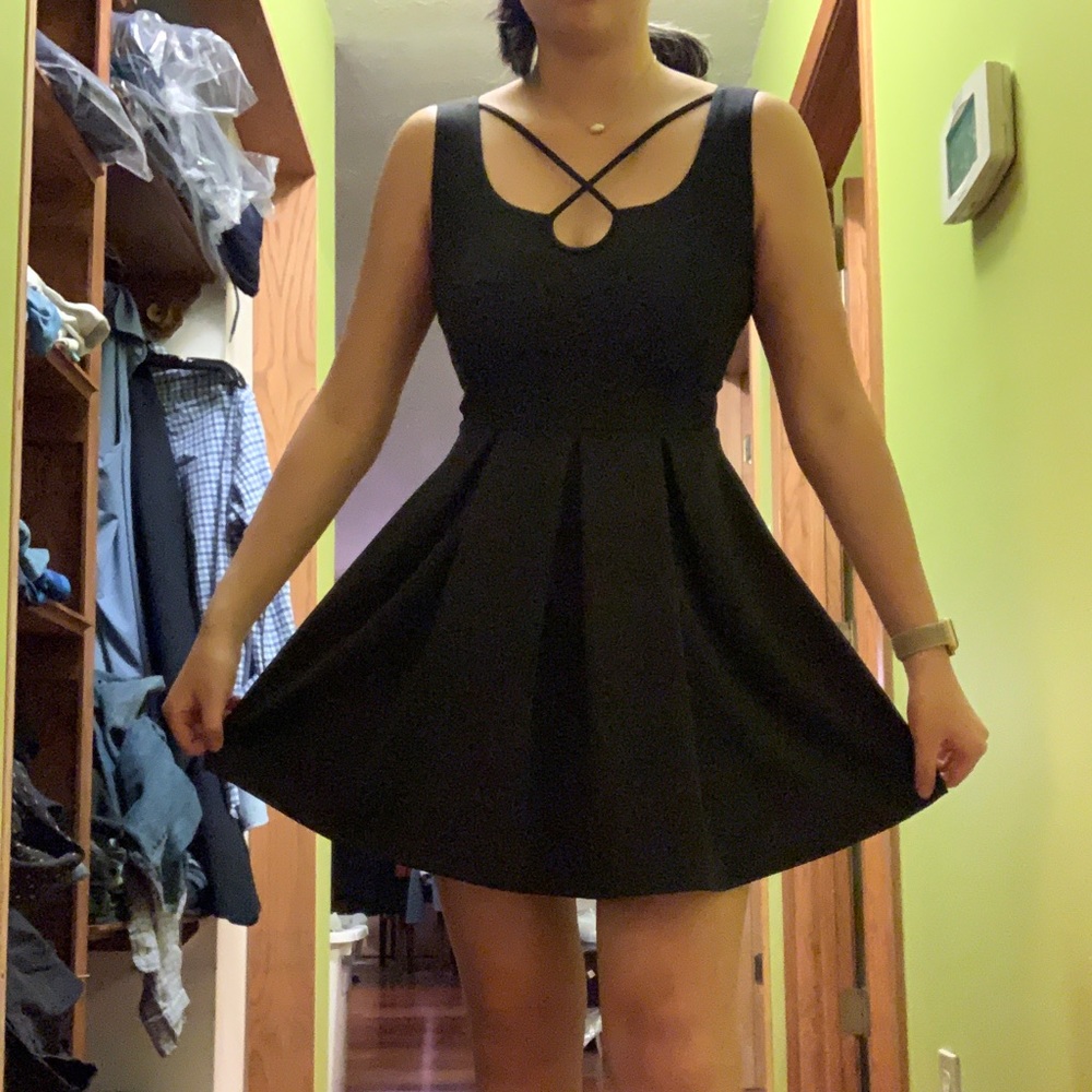 Pleated black dress with mint green lace